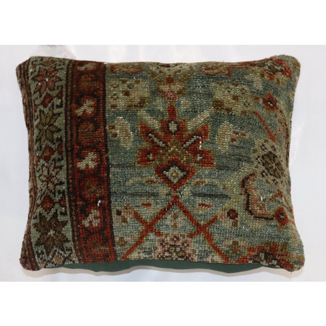 Pillow made from a sea foam-colored 20th-century Persian rug. Measures: 12" x 17".