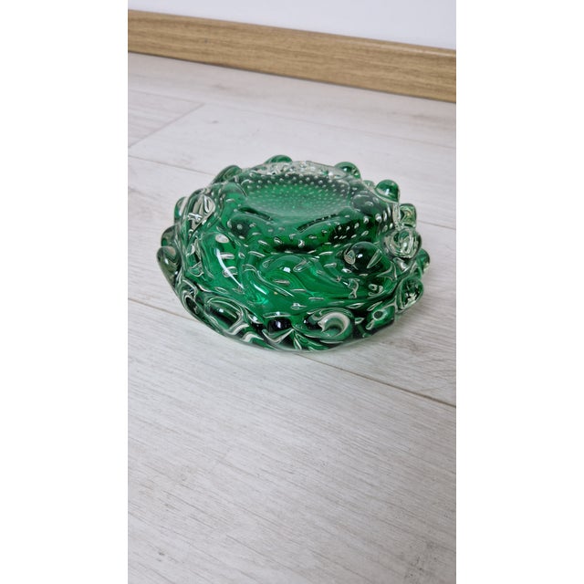 Empty Pocket in Green Murano Glass, in Very Good conditions. Designed 1960 to 1969 This piece is attributed to the...