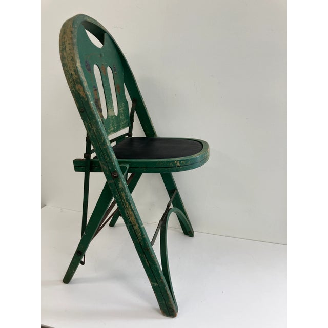 Likely produced in the 1930s or 1940s by the regional U.S. furniture maker St. Louis Folding Chair Company, known for...
