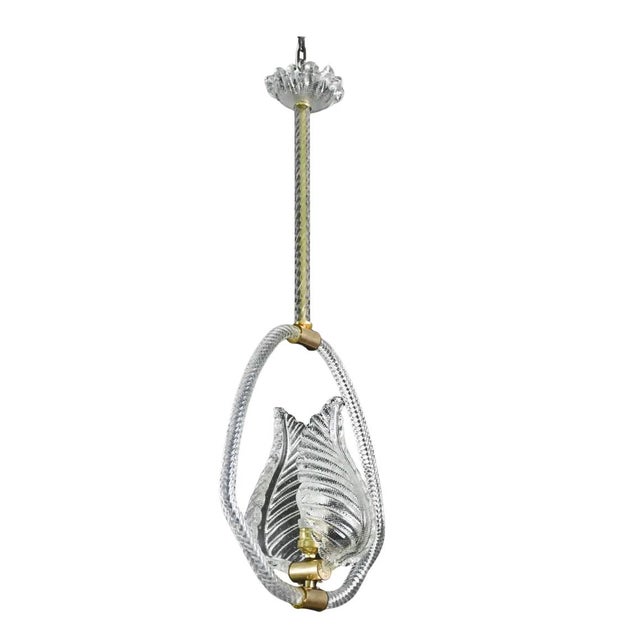 Unique pair of Murano chandeliers, Barovier and Toso glassworks, one pink and one transparent with two beautiful leaves....