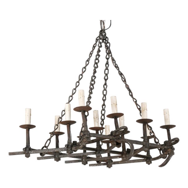 Mid 20th Century French 12-Light Forged Iron Chandelier For Sale