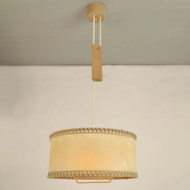 Counterbalance pendant with centre weight. High quality hand made drum shade in real moves smoothly up and down on the...