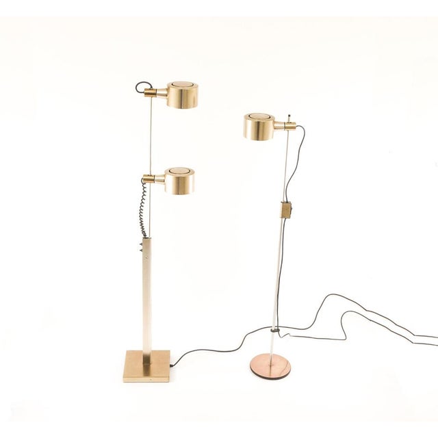 Unique set consisting of two different, but matching and rare floor lamps by Ronald Homes for Conelight Limited. The lamps...