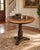 A wonderfully decorative round pedestal table featuring an Old World Italianate design with Renaissance Revival and...