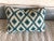 A small lumbar pillow cover with a bold pattern made with Kravet’s Caribbean Ikat. Zipper closure. Insert sold separately.