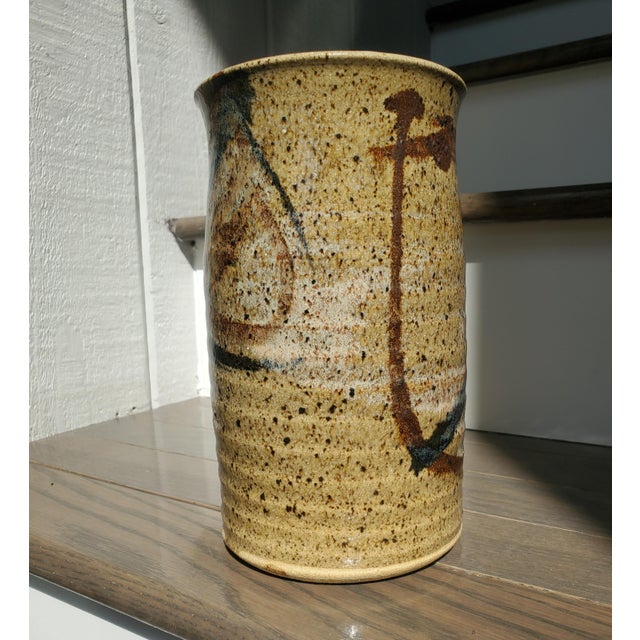 Beautifully minimal 1970s handmade vase with abstract shapes and speckled glaze. A perfect vessel for colorful Fall...