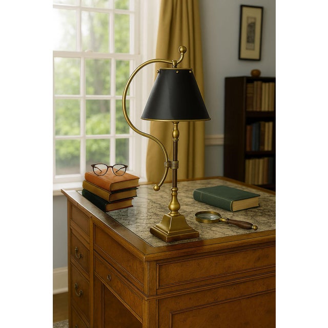Offering a French Bouillotte style brass desk or table lamp with black painted brass shade, circa 1970s. This unique lamp...