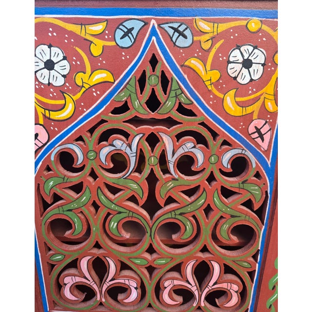 A beautiful hand‑painted Moroccan medicine cabinet / wall shelf from Morocco, standing approximately 22" tall, 18" wide,...