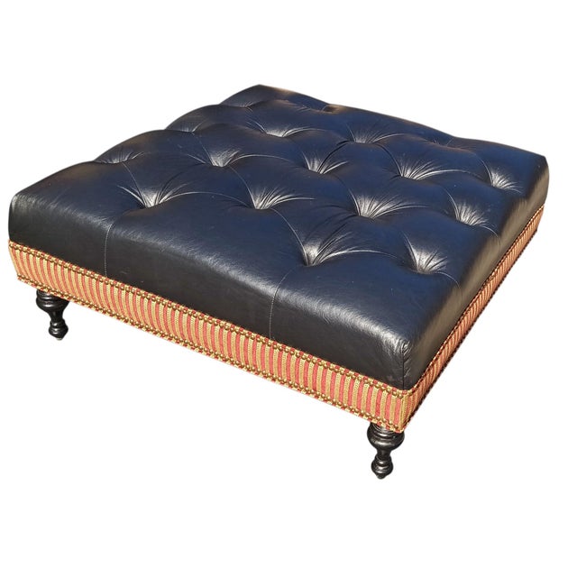 Experience the classic heritage &contemporary clean lines with the Monrowe Leather Loveseat with a custom ottoman The...