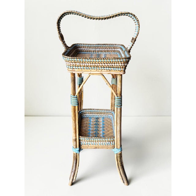 Rattan Serving Cart, Napoleon III Period This is a woven rattan serving cart with a natural bamboo frame. It features two...