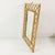 Wall mirror from Italy, 1960s. Made of bamboo and rattan. Includes a hanging loop. Geometric, decorative design....