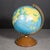 ABOUT A mid-century all metal 8" globe with brass bracket and metal base. CREATOR Replogle. DATE OF MANUFACTURE...