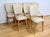 This set of eight chairs represents the retro style of the 1960s, a period marked by the boldness of shapes and the...