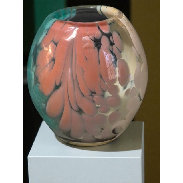 The Vintage Hand Blown Art Glass Monte Dunlavy Signed Vase is a unique piece of colorful abstract art made in the United...