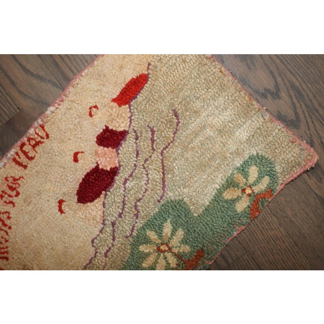 a mini size american hooked rug from the early 20th century