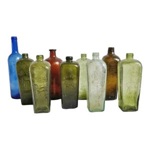 Set of Nine Antique Glass Gin Bottles