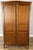 This elegant Vintage French Louis wardrobe showcases refined craftsmanship with a warm oak finish, gently curved panelled...