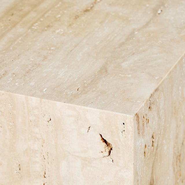 Stunning plinth side tables in natural warm unfilled travertine romano. With a travertine base set back gives this modern...