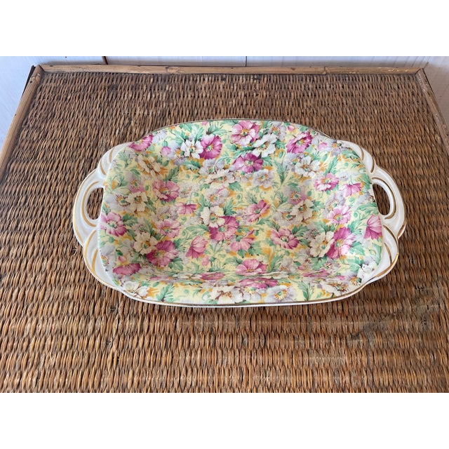 English Ridgway floral dish! This charming deep dish is covered in spring flowers and has elegant handles to carrying...