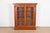 A gorgeous American Empire, Victorian, or Neoclassical style bookcase cabinet In the manner of R.J. Horner & Co. USA,...