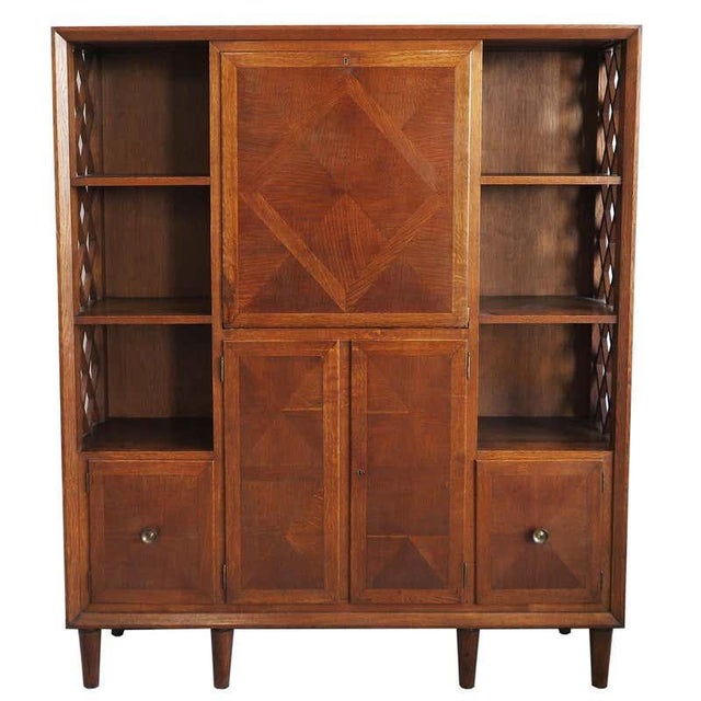 Early midcentury cabinet attributed to E. Lanzia from Italy circa 1940s. The oak frame features subtle parquetry inlay...