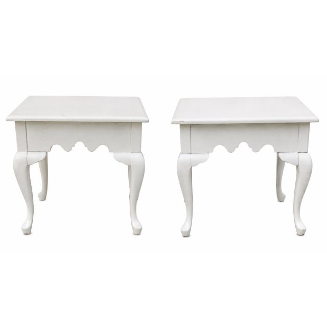 Details: -Pair white Queen Anne style end/side tables with brass pulls -Finished in soft, white factory paint with...