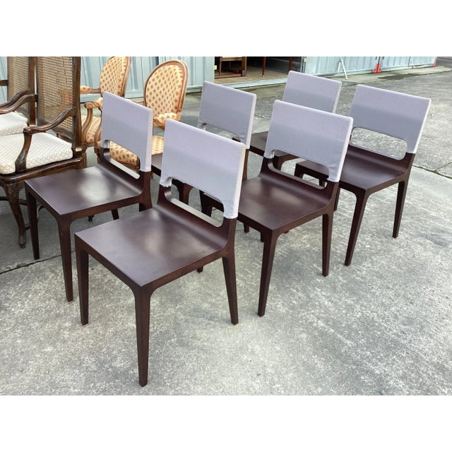 You will love this ultra-chic set of Ligne Roset French dining chairs. With straight, contemporary lines, these chairs...