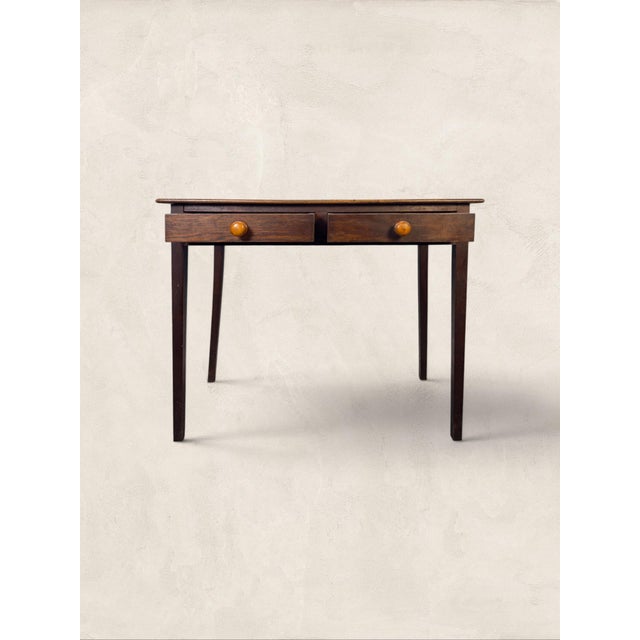 Antique English Oak Two Drawer Side Table on Tapered Legs Two drawers, tapered legs, and over a century of honest use,...