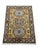 Three bold medallions run down the warm gold field of this Kazak rug. Burgundy and light blue motifs add contrast, while a...