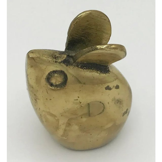 Cute modern brass mouse paperweight. Would look great on your office desk.