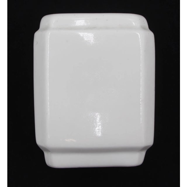 Vintage European surface mount toothbrush holders made of white ceramic. The original mounting screws are not available....