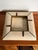 A glamorous vintage Maitland-Smith ashtray featuring hand-applied tessellated stone with contrasting brass trim. Its...