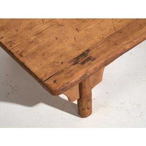 Antique low table in pine wood, traditional chinese furniture originating from northern china and dated circa 1930....