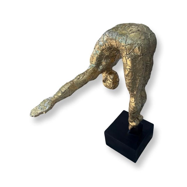 Vintage Bending Diver Gilded Resin Great Sculpture on black wood Base.