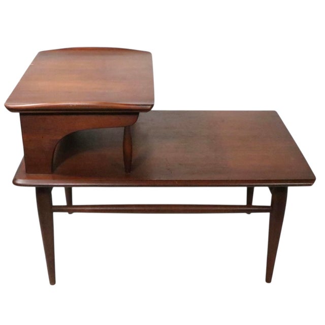 Classic mid century step end table made by Bassett Furniture as part of the Artisan series, constructed of solid wood, and...