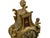An elegant Louis XV-style table clock, featuring a sumptuous gilded bronze case richly engraved with rocaille motifs,...