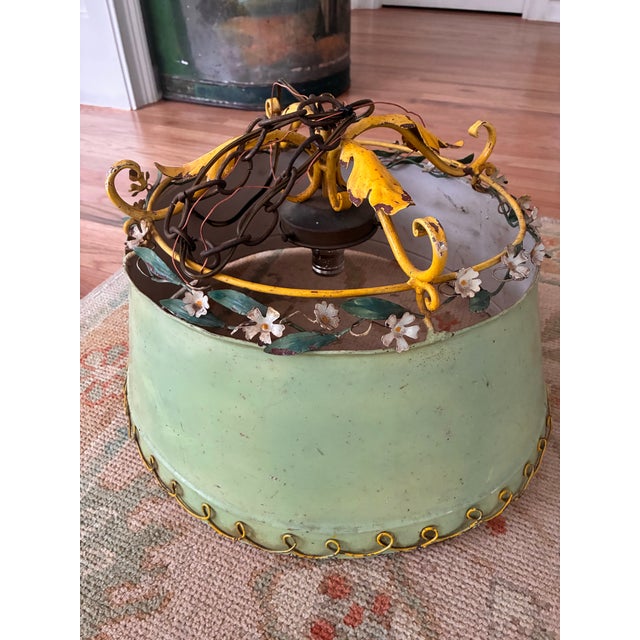Wonderful vintage Italian tole metal shade pendant circa 1950s. Measures 18” round at bottom by 11” high and 16” wide at...