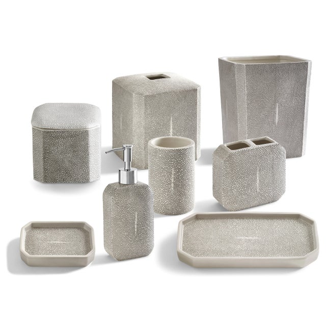 Crafted from fine porcelain and embossed to give the appearance of true shagreen texture, this exotic accessory set brings...