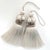 Pair of silver/gray colored key tassels with hand cut velvet ruche, decorative gimp and twisted cord detail. **Please...