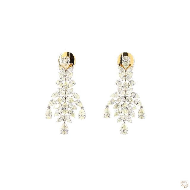 This set of earrings centers on a 12.72-carat diamond in a graceful pear cut. It is framed by diamond accents for added...