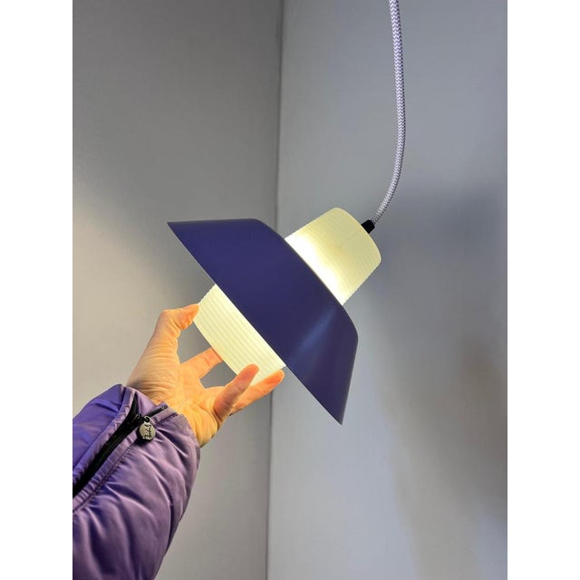 This pendant lamp from Denmark plays with deliberate contrasts and a clean, minimalist design. It combines timeless...