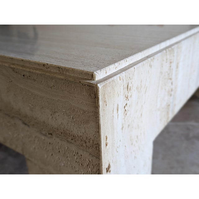 Timeless postmodern coffee table in travertine marble. This 80's vintage one-owner table is in near perfect condition....