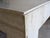 Timeless postmodern coffee table in travertine marble. This 80's vintage one-owner table is in near perfect condition....