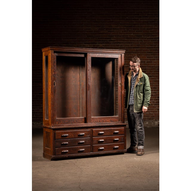 An impressive early-20th-century laboratory storage and display cabinet by Kewaunee Manufacturing Co., associated with...