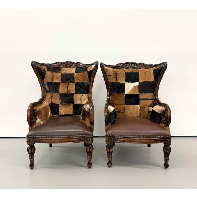 Traditional Vintage Carved Wood Patchwork Cowhide Wingback Chairs - Pair For Sale - Image 3 of 9