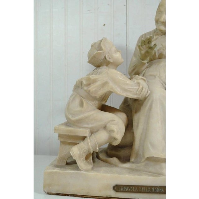 Antique E. Battiglia La Favola Della Nonna Alabaster Italian Sculpture "Tale of Grandma". Item features ornate details,...