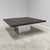 Remarks: Vintage brutalist style coffee table by Peter Draenert, Germany 1970s. Polished stainless steel base with fossil...