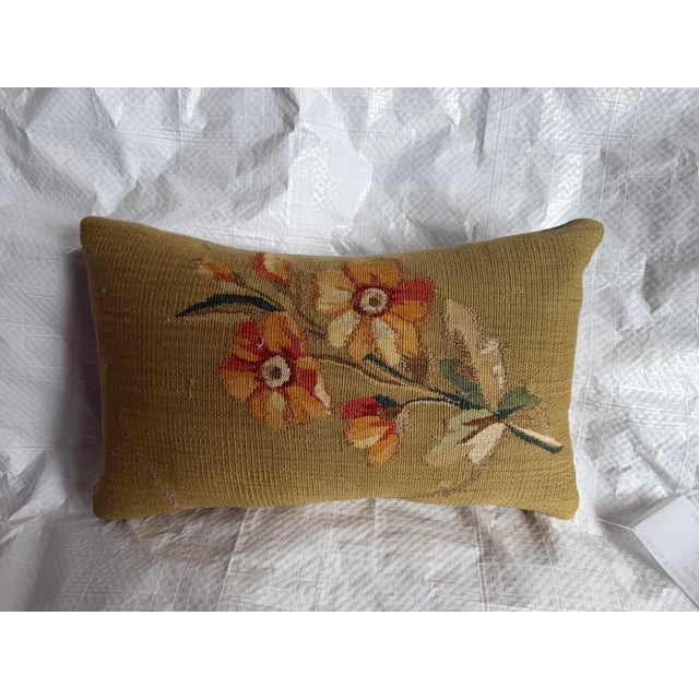Dating to the mid-19th century, this authentic Aubusson tapestry fragment showcases a beautifully balanced floral...
