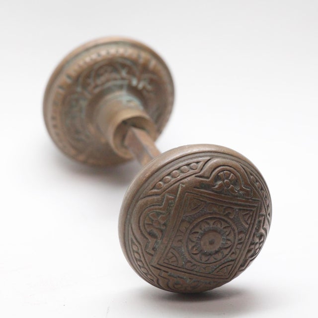 This Vernacular style four fold door knob was made by Corbin in the 1885 catalog. It is part of the H-21700 group. Good...