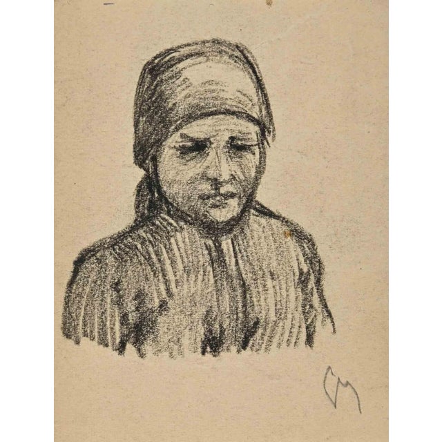 The Portrait Of A Farmer Woman is an original Drawing in charcoal on creamy-colored paper realized by An anonymous artist...